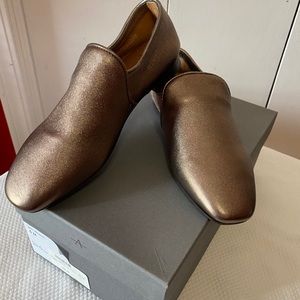 Aquatalia gold metallic loafers.